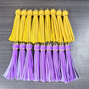 PU leather tassel keychain charms in yellow and purple with gold metal caps
