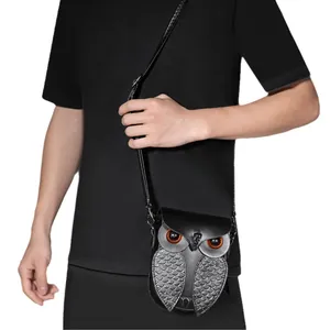 Sac à bandoulière hibou steampunk pour femme en cuir PU noir avec plumes argentées