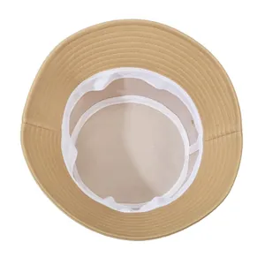 Inside view of khaki cotton bucket hat showing sweatband and stitched brim details