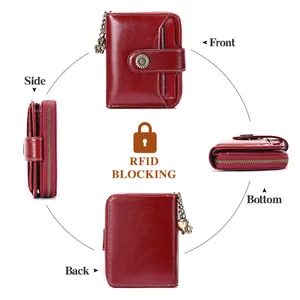 Deep red leather wallet with RFID blocking, metal sunflower buckle and leaf pendant