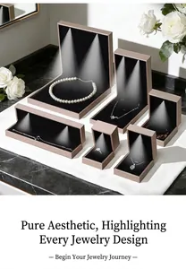 Detail of premium champagne LED jewelry boxes for necklaces and rings with focused spotlight