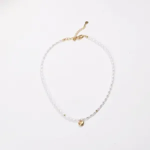 Elegant 18k gold plated titanium necklace with white oval pearls and a heart pendant