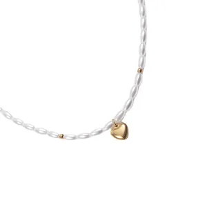 Elegant 18k gold plated titanium necklace with rice pearls and a polished heart pendant