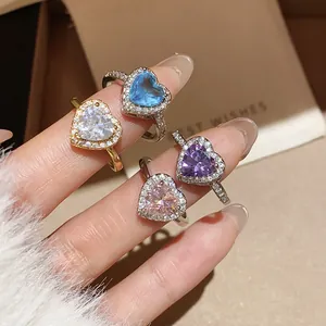 18k gold plated heart ring set with colorful zircon stones worn on hand