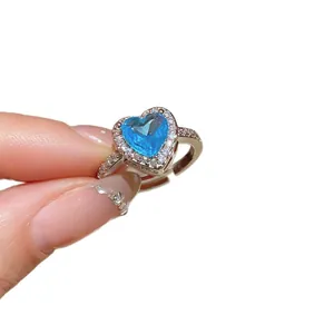 18k gold plated silver ring featuring a blue heart-shaped cubic zirconia and accents