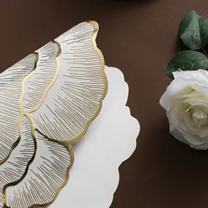 Nordic peony floral table mat with golden embossed texture and elegant wavy edge