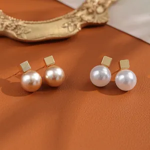 Elegant 2-pair set of champagne and white pearl stud earrings with gold square bases