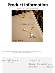 Detail of 21cm gold clover anklet with white pearl beads and stainless steel chain