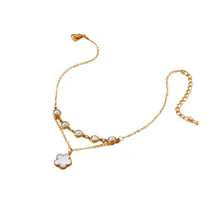Gold stainless steel anklet with white floral pendant and small pearl beads decoration