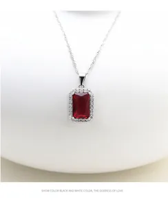 Macro detail of rectangle red crystal pendant necklace with sparkling micro-inlaid zircon
