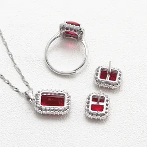 Vintage S925 silver jewelry set with emerald-cut red gemstones and halo diamonds