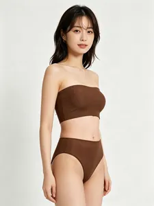 Detail of high-waisted chocolate brown two-piece strapless bikini set in premium stretch fabric