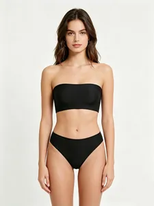 Close-up of black strapless bandeau bikini set with seamless high-stretch matte fabric