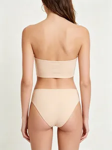Rear view of a beige seamless strapless tube top and high-elastic panties set on model