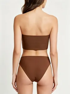 Rear view of a seamless coffee brown strapless bandeau bikini set with a matte finish