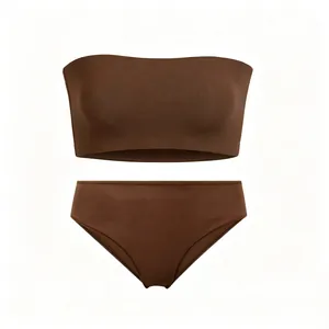 Detail of a dark brown strapless seamless bandeau bra and high-waist panty set