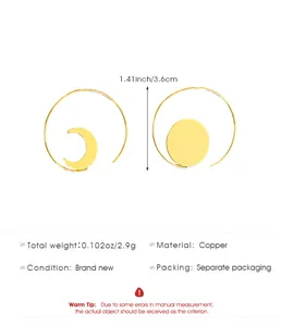 Detail view of asymmetric celestial earrings with moon pendant and size specifications