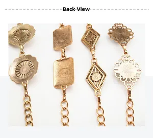Reverse view of vintage gold metal waist chain showing intricate textured geometric patterns