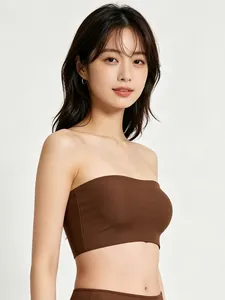 Detail view of seamless dark brown strapless bandeau bra on female model side profile