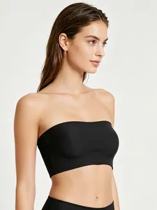 Close-up of black seamless bandeau top with high elastic breathable fabric on model