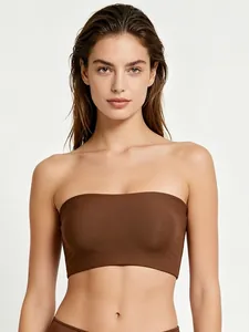 Detail of a dark brown seamless bandeau top showing high-elasticity matte fabric texture