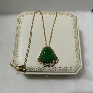 Green jade Buddha pendant necklace with gold plating and zircon inlay on jewelry box