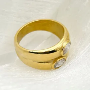 Vintage gold-plated stainless steel wide ring with dual oval cubic zirconia stones