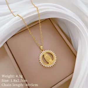 Detailed view of Virgin Mary pendant with dimensions 1.8x2.5cm and chain length 40+5cm