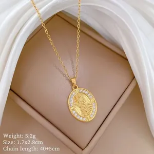 Macro detail of gold Virgin Mary pendant with cubic zirconia and 40+5cm chain specs