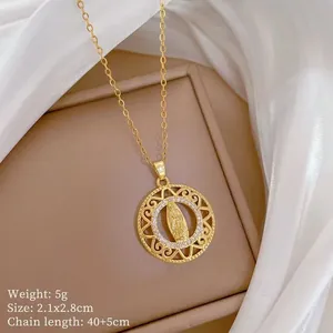 Detail of a gold Virgin Mary pendant with cubic zirconia inlay and product dimensions