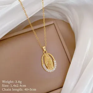 Detailed view of Virgin Mary gold pendant with sparkling micro-inlaid cubic zirconia