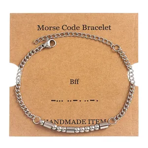 Silver Morse code bracelet with beads on a BFF display card for minimalist jewelry gift
