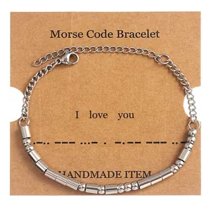 Silver Morse Code bracelet with I Love You beads on handmade brown display card