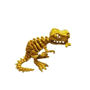 3D printed articulated golden Tyrannosaurus Rex skull skeleton model on white background