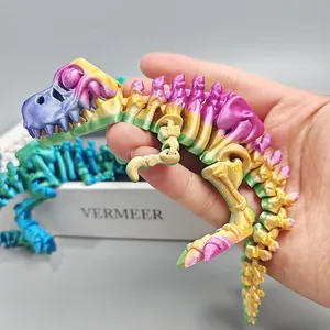3D printed T-Rex skeleton toy with movable joints in gradient and blue colors