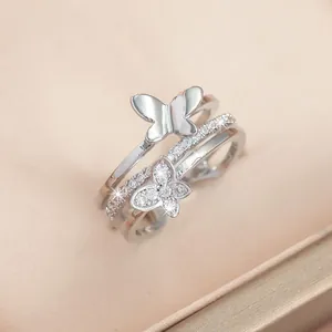 Three-layer butterfly ring in silver finish with pavé zircon stones and polished butterfly