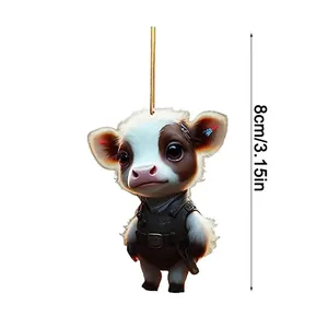 Close-up of 8cm cartoon cow acrylic pendant with detailed brown spots and golden cord