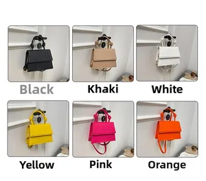 Mini knotted handle crossbody bags shown in six vibrant colors like orange and rose red