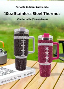 Detail of 40oz stainless steel tumblers with rhinestone football patterns and handles