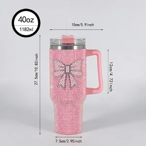 40oz stainless steel tumbler with pink rhinestones and silver bow pattern with straw
