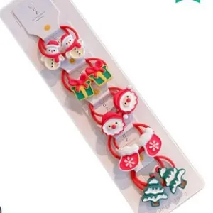 Christmas themed kids hair scrunchies set featuring snowmen, trees and festive patterns