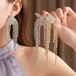 Glamorous luxury rhinestone fringe earrings in diamond shape with sparkling finish