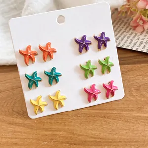 Juego de seis pares de pendientes de estrella de mar en esmalte de color