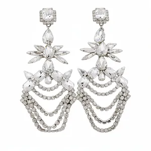Elegant silver-toned chandelier earrings featuring cascading crystal stone tassels.