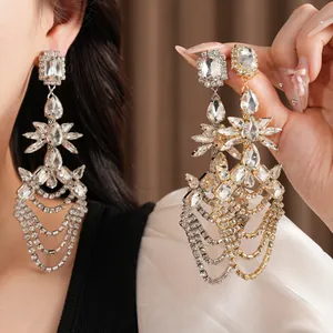 Statement geometric teardrop tassel earrings with sparkling square and pear cut crystals