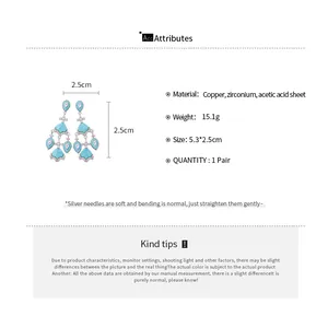 Infographie montrant les dimensions et les matériaux de ces boucles d'oreilles en éventail
