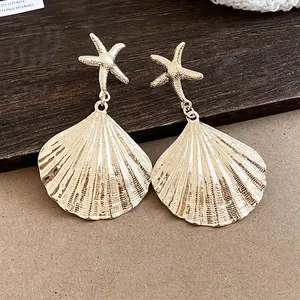 Elegante übergroße goldene Seestern und Muschel Ohrhänger für Damen Strandurlaub