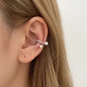 Elegant silver finish zircon and pearl ear cuff for non-pierced ears, macro lifestyle view