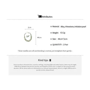 Detailed view of the elegant rhinestone and imitation pearl necklace and earring set