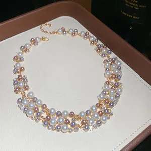 Detailed view of French vintage multi-layer pearl necklace with sparkling rhinestones